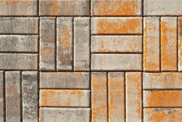 Cobblestone texture. The sidewalk tile is evenly folded. Brown and orange cobblestones close up. - Valokuva, kuva
