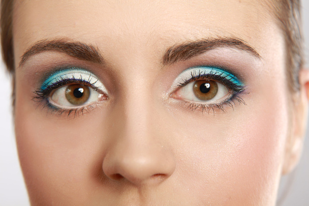 Woman eye with exotic style makeup - Фото, изображение