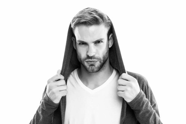 Mysterious look. Casual and comfortable. Male fashion. Fashionable model man. Fashion trend. Street style outfit. Handsome man hood standing white background. Clothes daily wear. Menswear concept - Foto, afbeelding