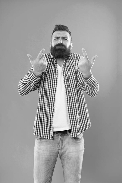 Listen to me. Bearded man gesticulate blue background. Brutal hipster in casual wear. Casual style. Casual fashion trends. Fashion and style. Casual and trendy - Foto, Imagen