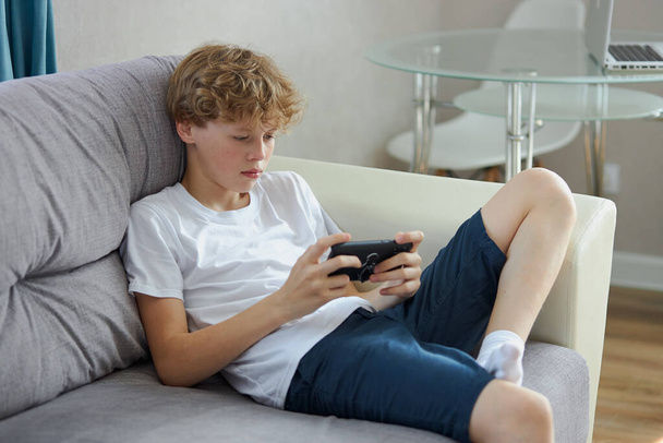 teen boy has phone addiction - Photo, Image