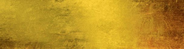 Gouden muur textuur achtergrond. Geel glanzend goud verf op muur serface met lichte reflectie, levendige gouden luxe behang vel, horizonta - Foto, afbeelding