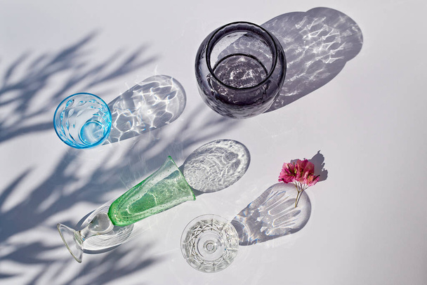 Set of empty glasses with shadows - Photo, Image