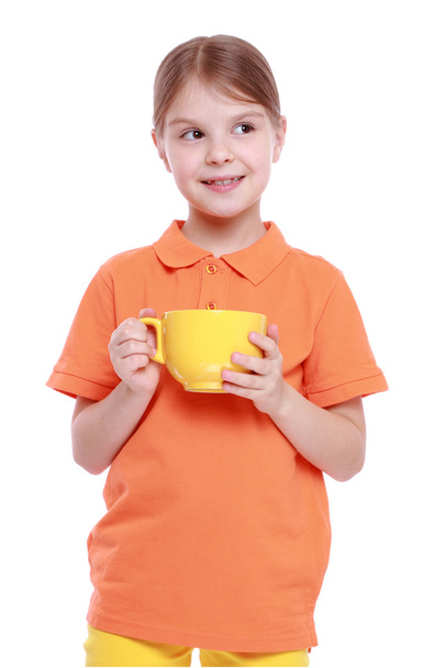 Kid with tea cup - Foto, imagen