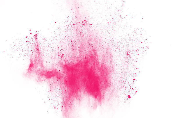 Abstraktní růžové práškové postříkané pozadí, Zmrazení pohybu barevného prášku výbuch / házení barevného prášku, barva třpytu textury na bílém pozadí. - Fotografie, Obrázek
