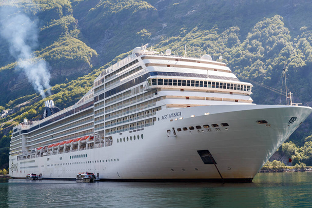 GEIRANGER, NORWAY - 2016 JUNE 14. MSC Musica cruise vessel inside the Norwegian fjord Geiranger - Photo, Image