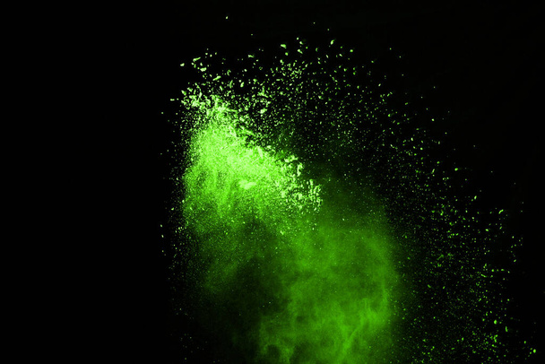 White powder explosion on black background. Colored cloud. Colorful dust explode. Paint Holi. - Foto, afbeelding