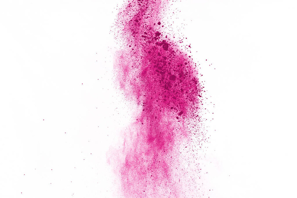 Αφηρημένη ροζ σκόνη πιτσιλισμένο φόντο, Πάγωμα κίνηση της σκόνης χρώμα έκρηξη / ρίψη σκόνη χρώματος, χρώμα glitter υφή σε λευκό φόντο. - Φωτογραφία, εικόνα
