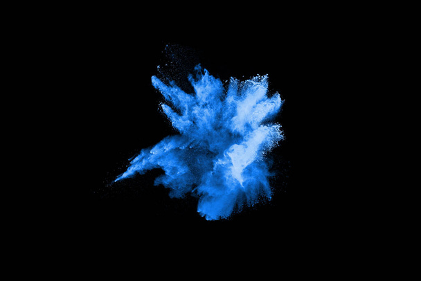 Blue powder explosion on black background. Colored cloud. Colorful dust explode. Paint Holi. - Zdjęcie, obraz