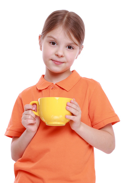 Kid with tea cup - Fotó, kép