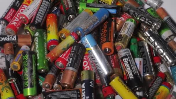 Many multicolored used AA batteries - Footage, Video