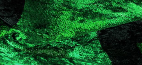 Texture, background, pattern, design, green velvet fabric, dense fabric of silk, cotton or nylon with a thick short pile on one side. - Photo, Image