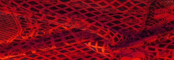 Texture, background, pattern. Ruby red lace fabric, a combination of red with black fabric. blushing, ruddy, florid, gules, blushful - Foto, immagini