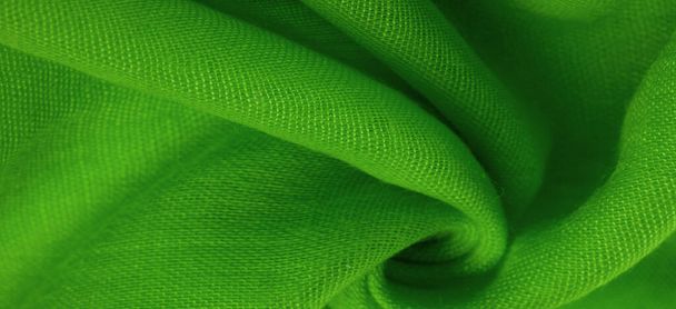 Textura. Pozadí tkaniny z hedvábně zelené matné barvy, (barva nebo povrch) je matný a plochý, bez lesku. - Fotografie, Obrázek
