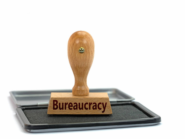 Houten stempel met de woorden bureaucratie - Foto, afbeelding