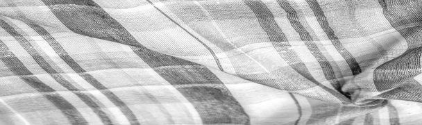 Фоновая текстура шотландской ткани, название которой напрямую указывает на страну ее происхождения. Второе и более точное название этого материала - тартан.. - Фото, изображение
