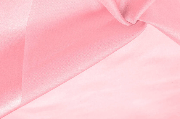 Hintergrundtextur, Pink Silk Dupioni, Duppioni oder Dupion Dies ist ein reversibler, knackiger Seidenstoff mittlerer Dichte mit einer flauschigen Textur und einem lockeren, glatten Gewebe. - Foto, Bild