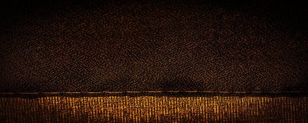 Hintergrundtextur Dunkle Sepia braun-gelbe Chiffonseide ist ein weiches transparentes Gewebe mit einer leichten Rauheit (matt, gekreppt) aufgrund der Verwendung von gedrehtem Garn. - Foto, Bild