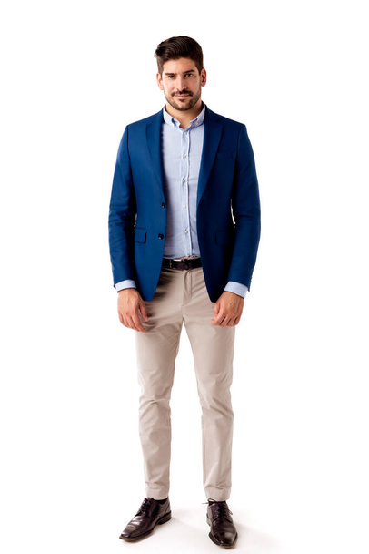 Full length shot of happy businessman wearing business casual clothes while standing at isolated white background. - Foto, Bild