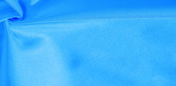Texture, fond, motif, tissu de soie en bleu. Cette soie est incroyablement exquise. Les projets qui en découlent dureront longtemps et seront toujours en assez bon état.. - Photo, image