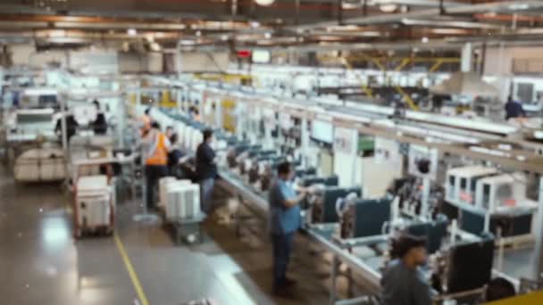 Blurred Workers at the Assembly Line of a Factory.  - Footage, Video