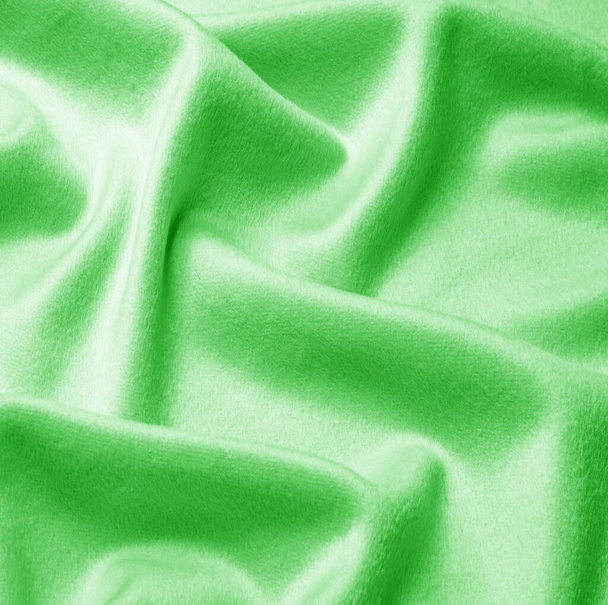 Textur, Hintergrund, Muster. Stoff warme Wolle ist grün, dick mit schwerem Gewicht, dies ist eine ausgezeichnete Wahl für Ihr Design, so dass die Projektmöglichkeiten unendlich sind. - Foto, Bild