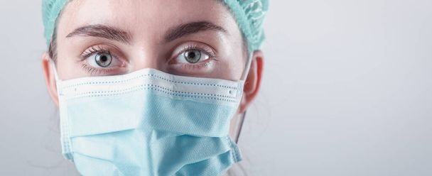 Medical Surgical Doctor and Health Care, Portrait of Surgeon Doctor in PPE Equipment on Isolated Background. Medicine Female Doctors Wearing Face Mask and Cap for Patients Surgery Work. Medic Hospital - Foto, immagini