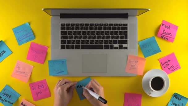 writing new remind note, post it papers on work place - Footage, Video
