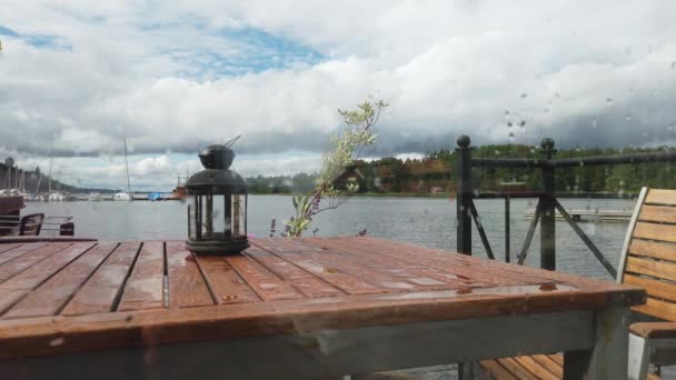 терраса с видом на гавань после дождя - Кадры, видео