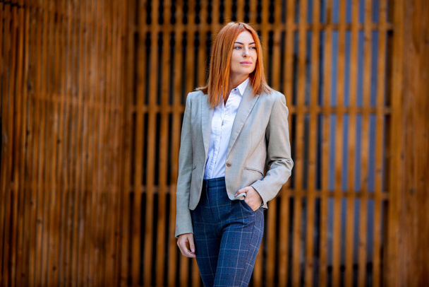 Confident business expert. Happy successful professional posing near office building. European girl. Russian business lady. Female business leader concept. Portrait Of Successful Business Woman - Foto, Imagem