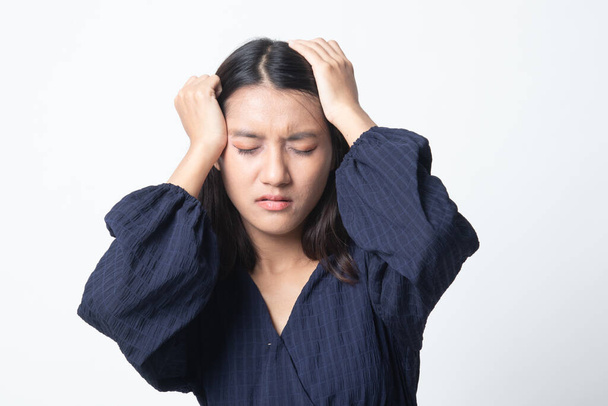Young Asian woman got sick and  headache on white background - Valokuva, kuva