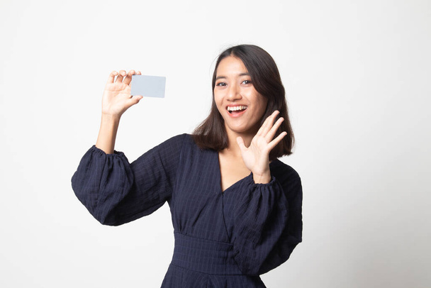 Young Asian woman happy with  blank card on white background - Foto, Imagen