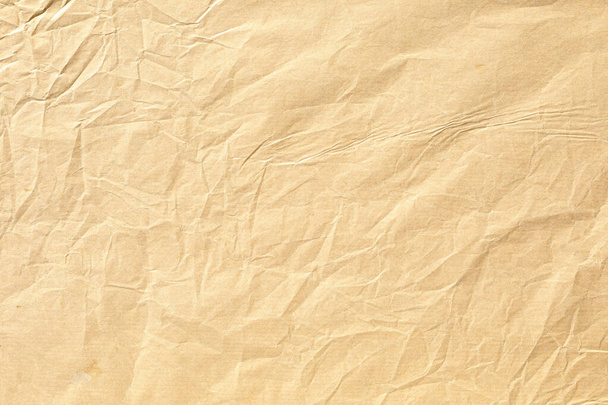 Starý světle žlutý zmačkaný papír pozadí textury - Fotografie, Obrázek