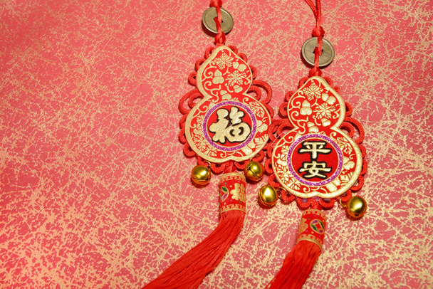 Traditional chinese knot,calligraphy mean happy new year - Valokuva, kuva