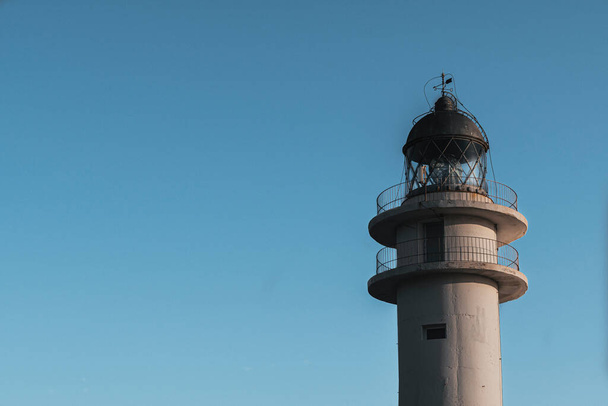Close view of the top of the lighthouse in Formentera - Fotoğraf, Görsel