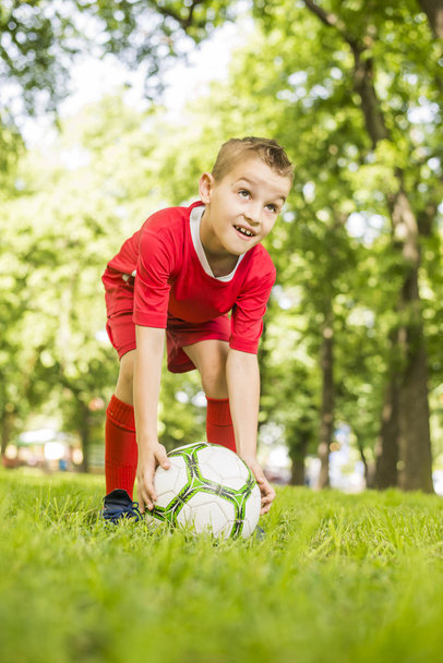 Feliz chico de fútbol
 - Foto, Imagen