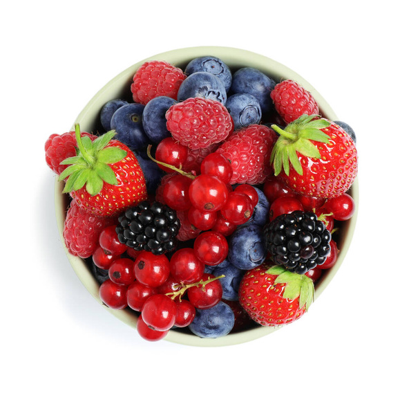 Mix of berries in bowl isolated on white, top view - Valokuva, kuva
