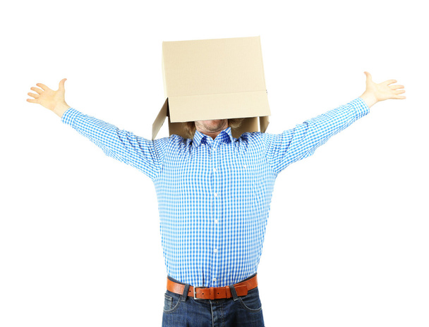 Man with cardboard box on his head isolated on white - Foto, Bild