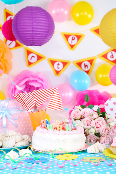 Festive table setting for birthday on celebratory decorations - 写真・画像