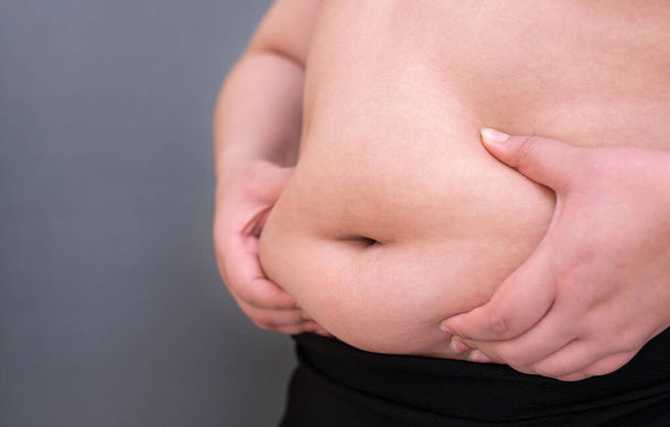 Mulher gorda., Molde o músculo saudável do estômago, e estilo de vida da dieta, para reduzir o conceito da barriga. - Foto, Imagem