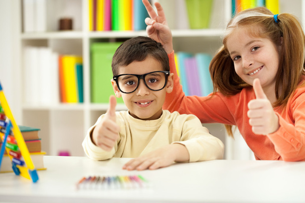 young brother and sister learning at home,funny concept - Photo, Image