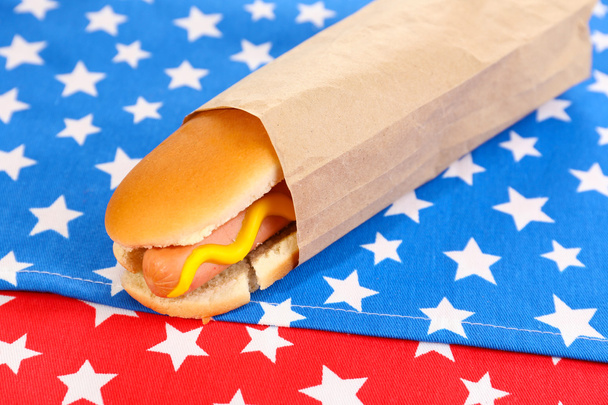 Tasty hot dog on napkin with stars - Photo, Image