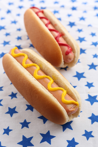 Tasty hot dogs on napkin with stars - Zdjęcie, obraz