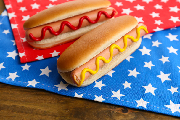 Tasty hot dogs on napkin with stars - Zdjęcie, obraz