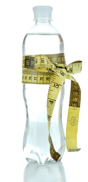 Bottle of water with measuring tape, isolated on white - Valokuva, kuva