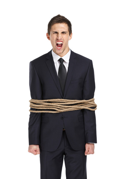 Screaming businessman tied with the rope - Photo, image