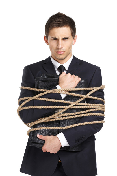 Businessman handing briefcase tied with the line - Φωτογραφία, εικόνα