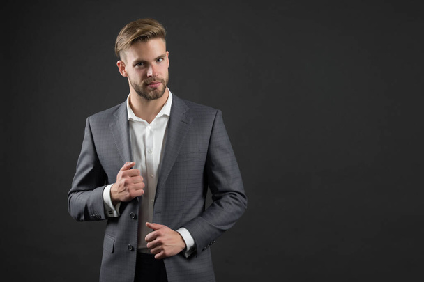 Man in blue suit jacket and shirt. Businessman with bearded face and stylish hair. Manager in formal outfit. Fashion, style and dress code. Business, entrepreneurship and career concept, copy space - Zdjęcie, obraz