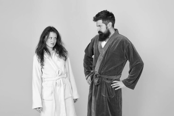 Being sad is a choice. Couple in love look sad. Sad woman and man wear bathrobes blue background. Family conflict. Depression and stress. Bedtime or morning routine. Health care. Unhappy and sad - Foto, Bild