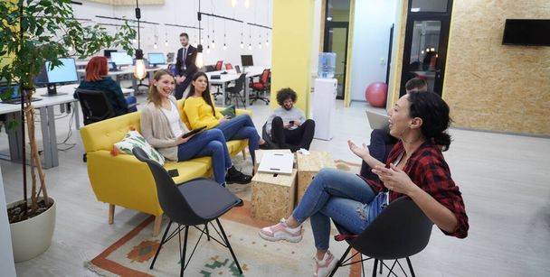 business people group in modern office have a team meeting and brainstorming while working on tablet or laptop  presenting ideas and take notes - 写真・画像